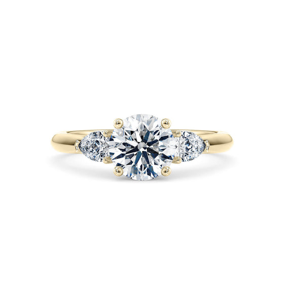 Round Brilliant and Pear Diamond Trilogy Engagement Ring